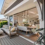 Luxury Beachfront Family Retreat | Stunning Ocean View, Private Hot Tub, Home Cinema