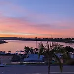 Water Views On Every Floor For This Multi Holiday Home - Walk To The Beach