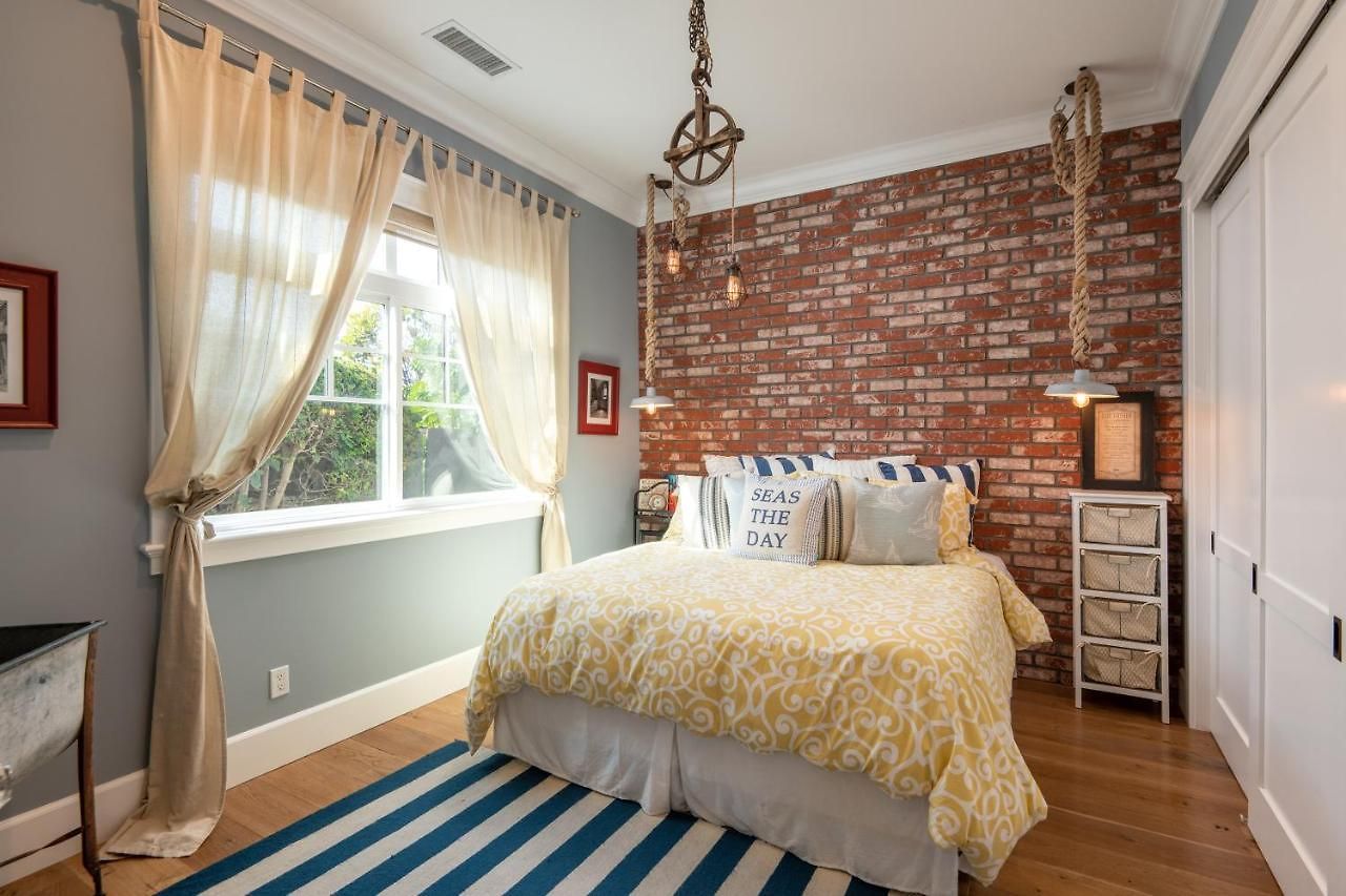 Holiday home Luxury Beachfront Family Retreat | Stunning Ocean View, Private Hot Tub, Home Cinema
