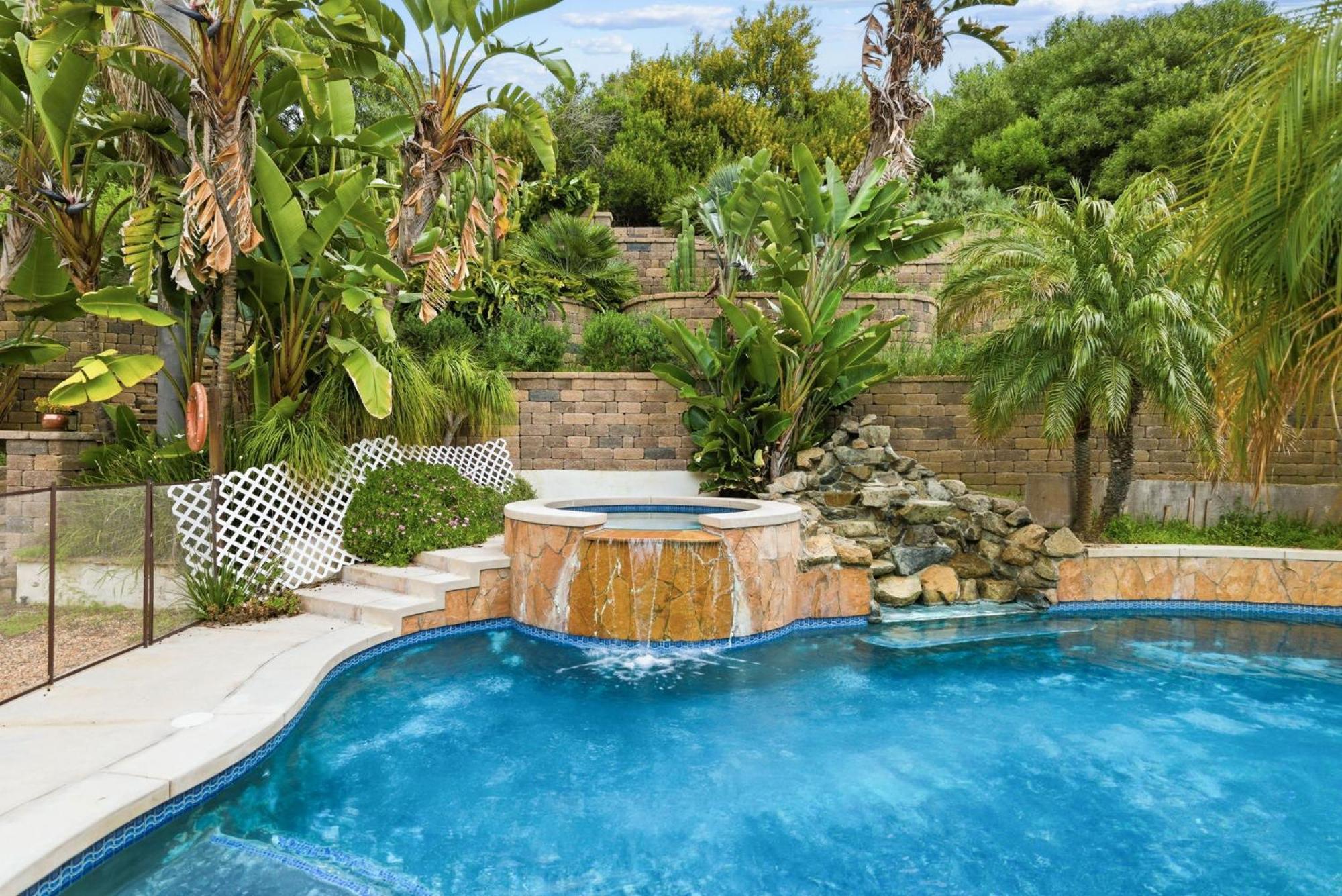 Pool Retreat With Hot Tub And Patio